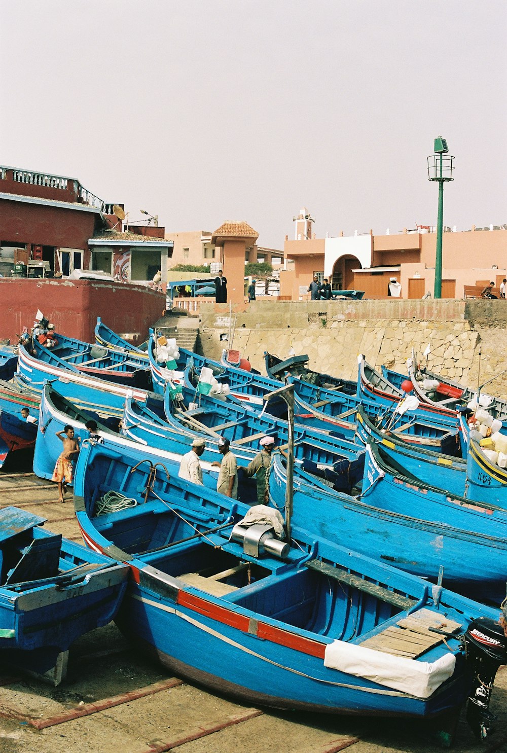 boats parked on the shore