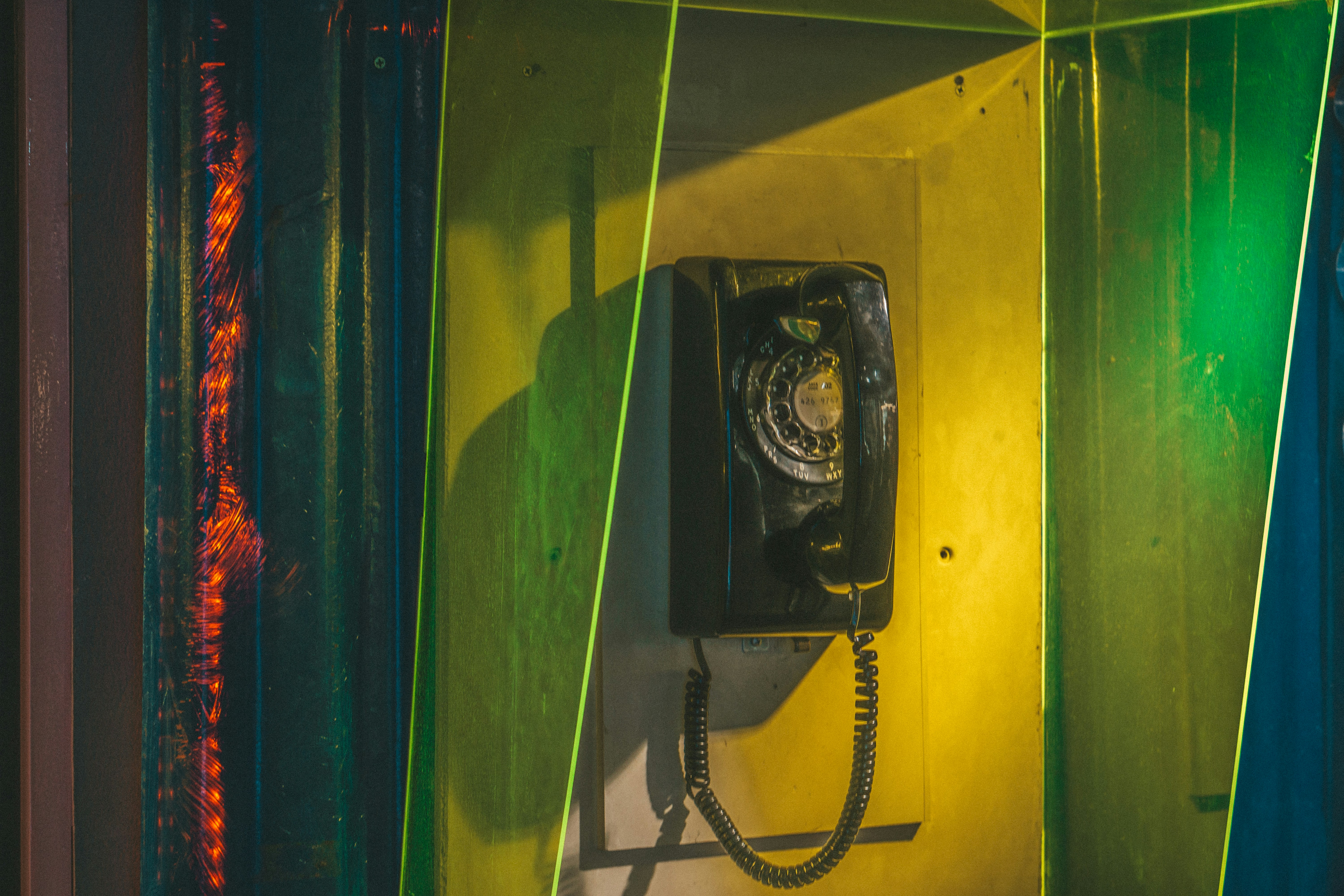 a black and yellow telephone