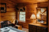 Cozy mountain retreat bedroom featuring warm lighting and natural wood accents.