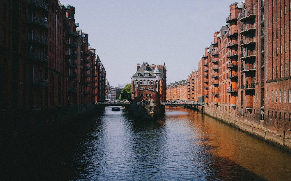 a river with buildings along it