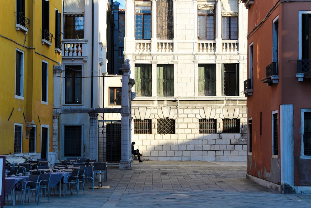 a street with tables and chairs