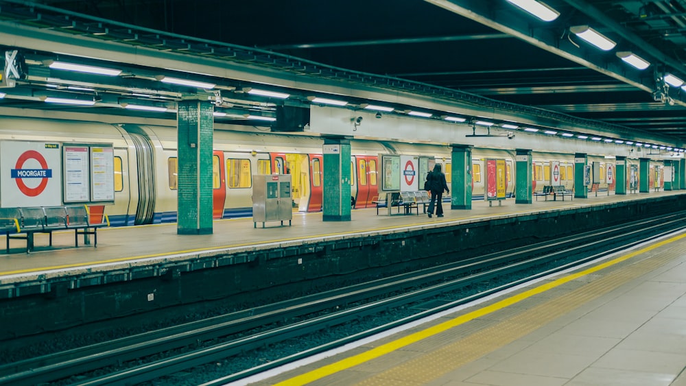 a person standing in a train station