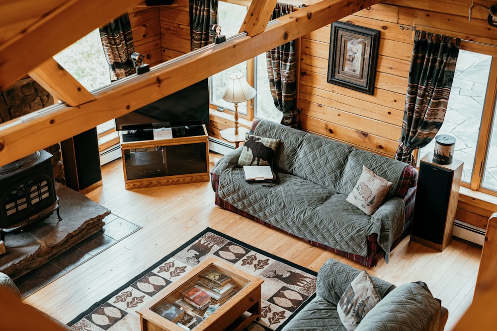 a living room with a couch and a fireplace