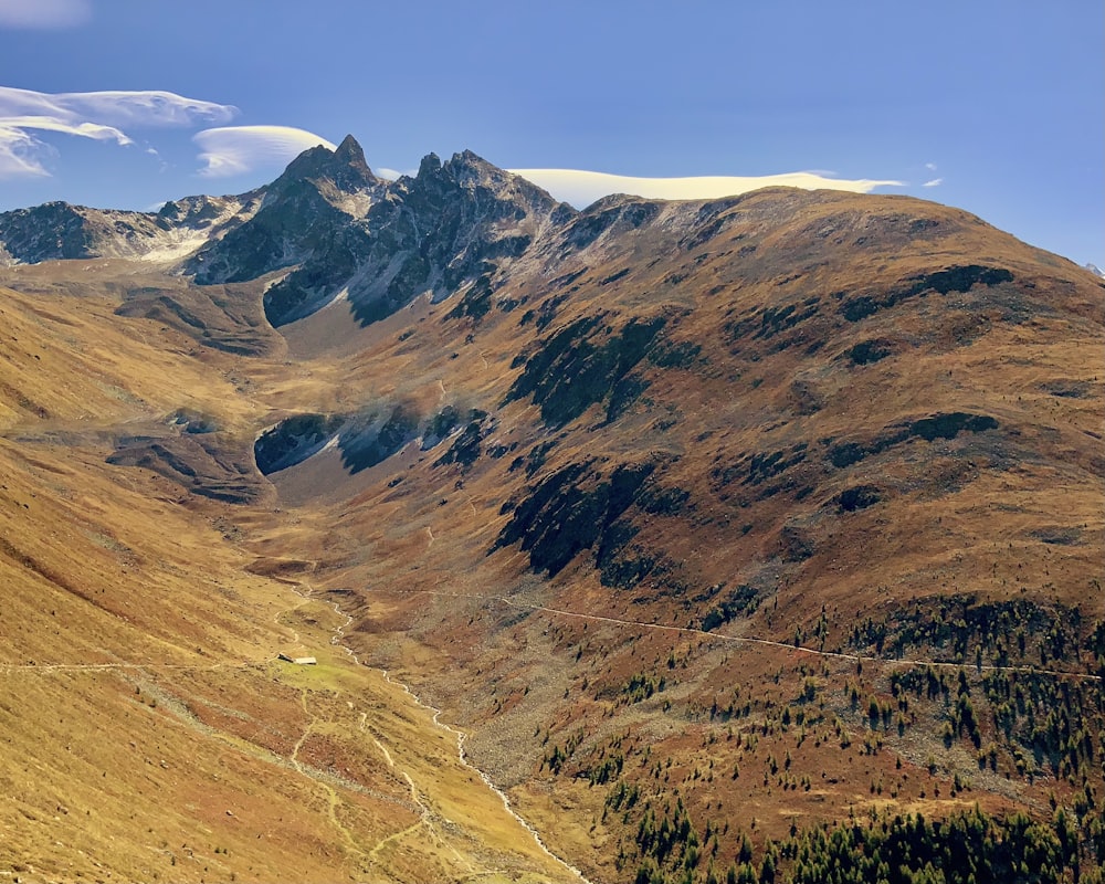 a mountain range with a valley below