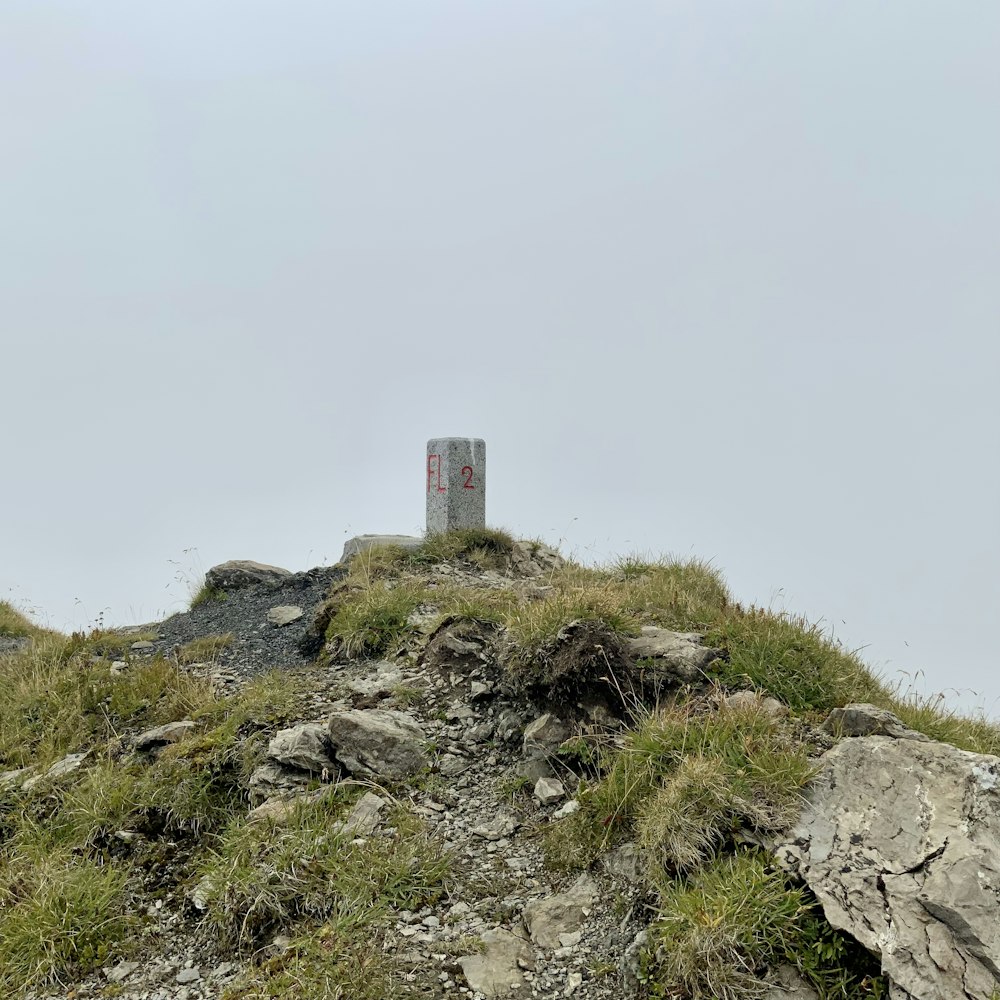 a stone tower on a hill