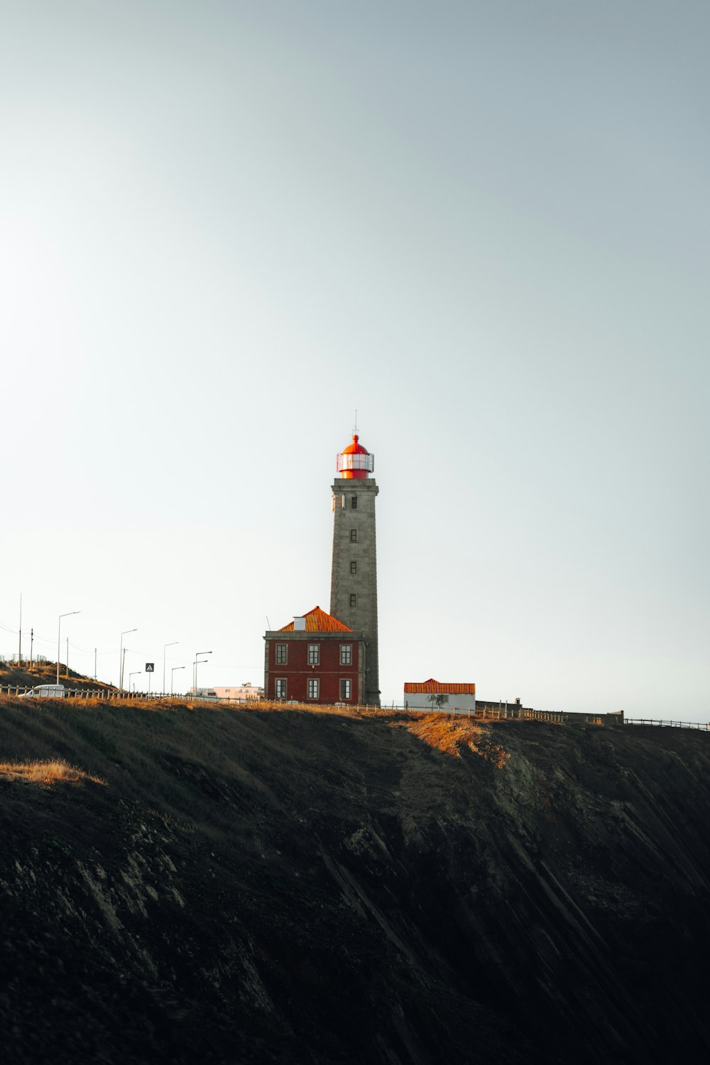 a lighthouse on a hill