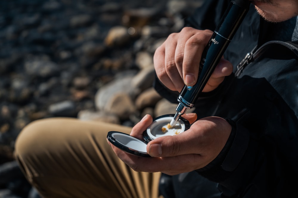 a person holding a fishing rod