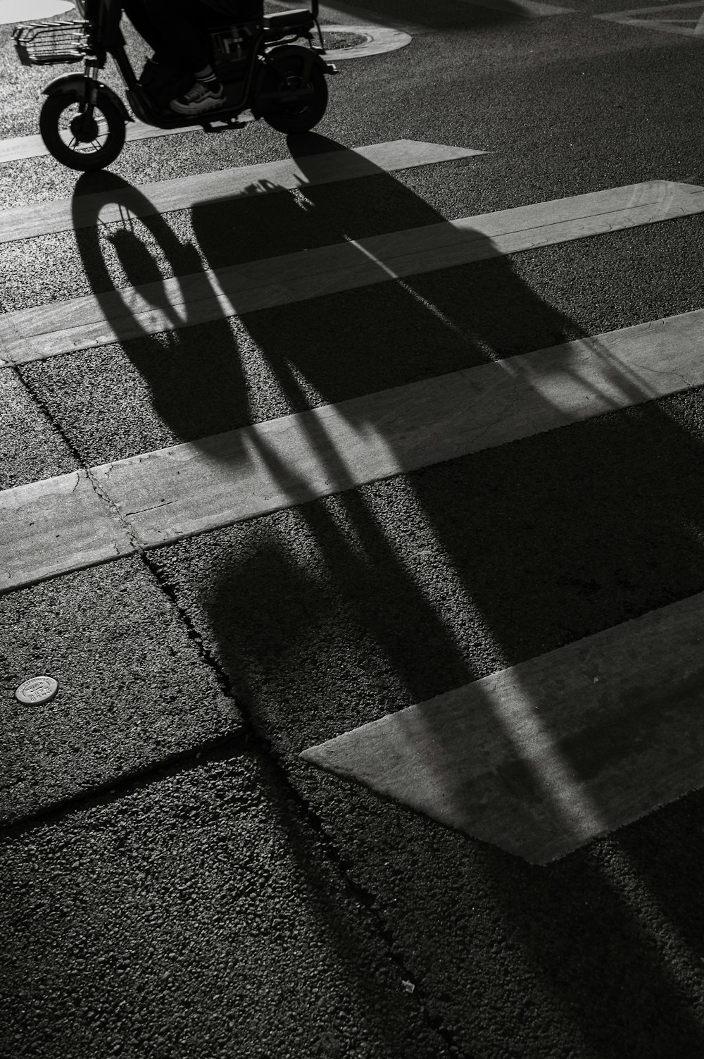 a person riding a bicycle on a street