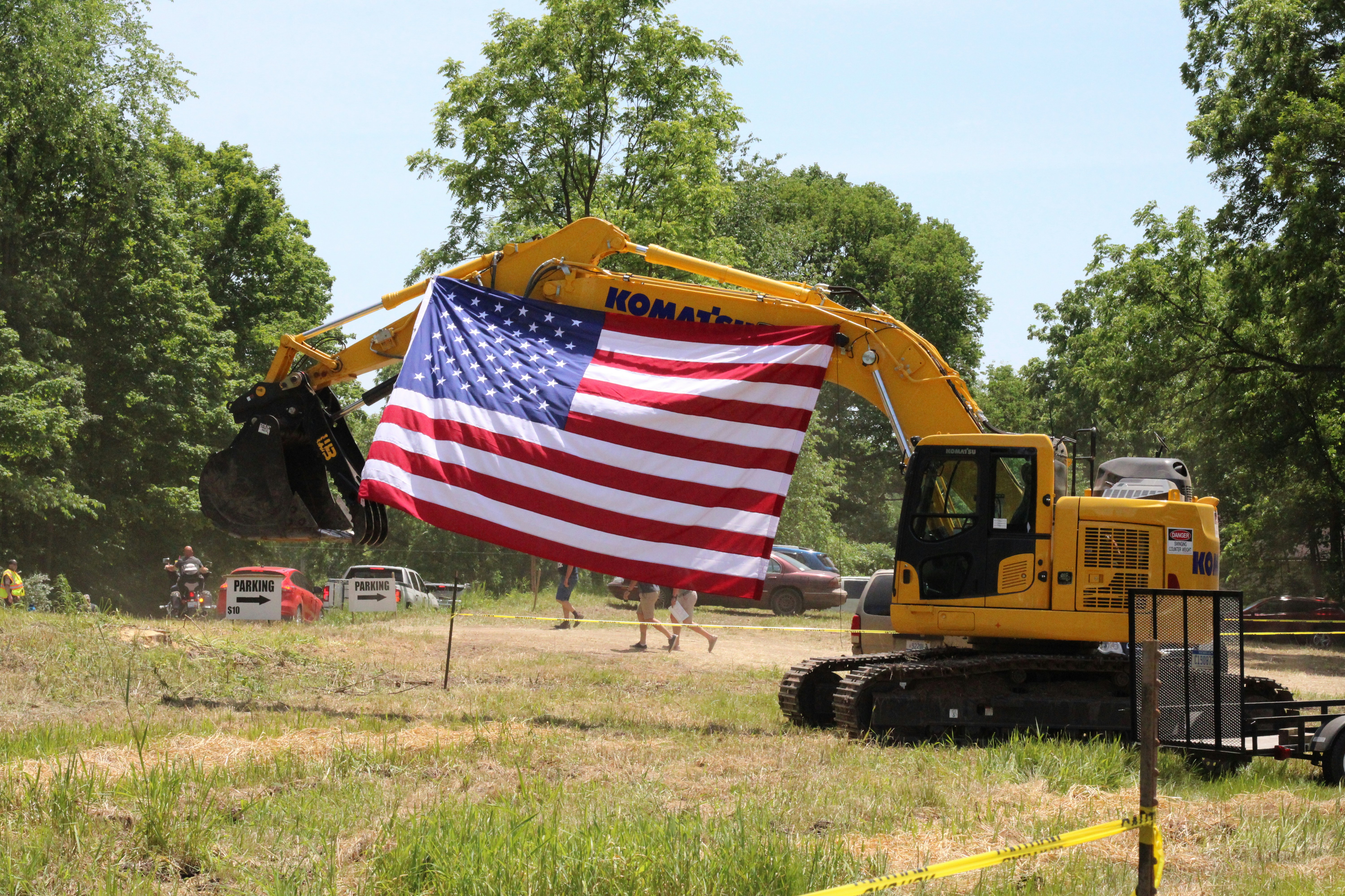 a flag on a yellow truck