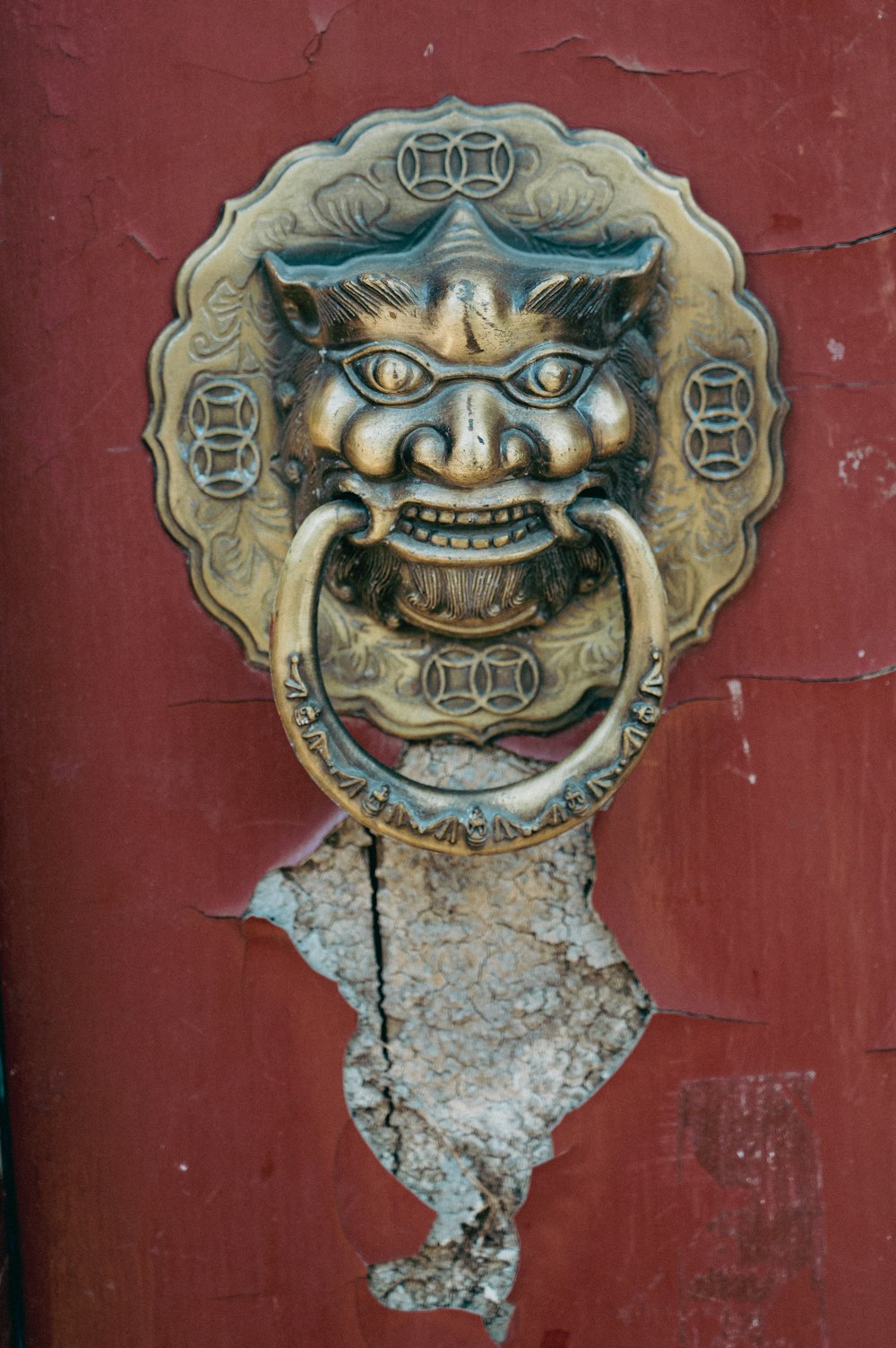 a door with a carved face
