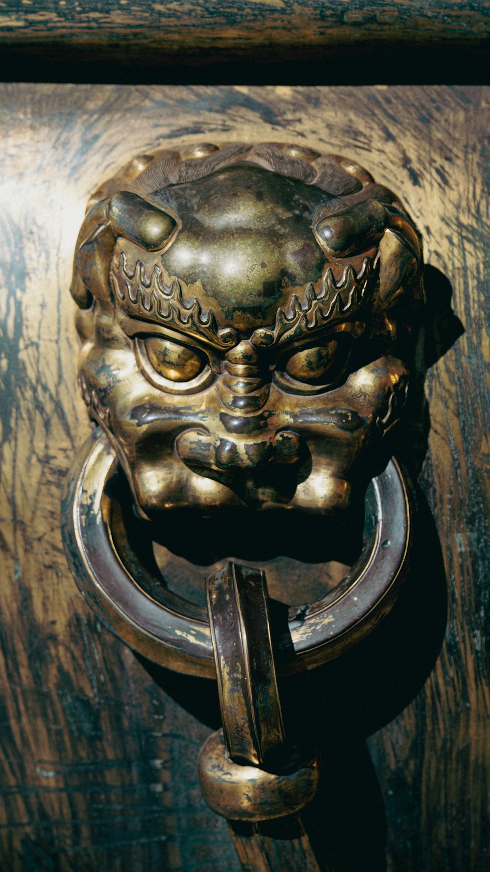 a metal mask with a face