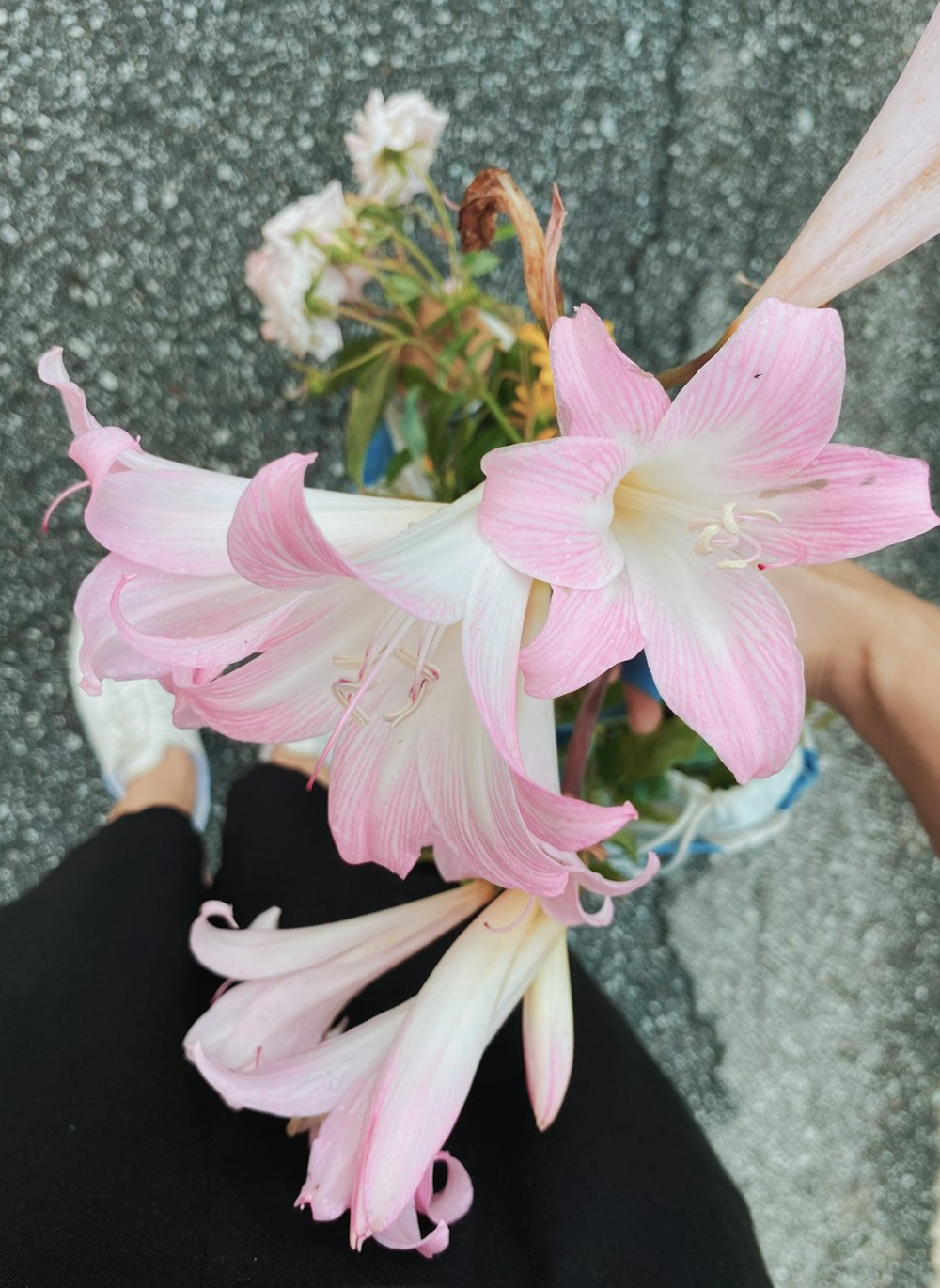 a person holding flowers