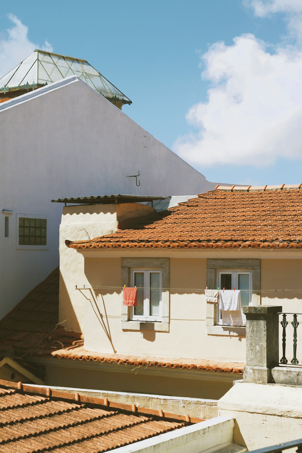 a white house with a red roof