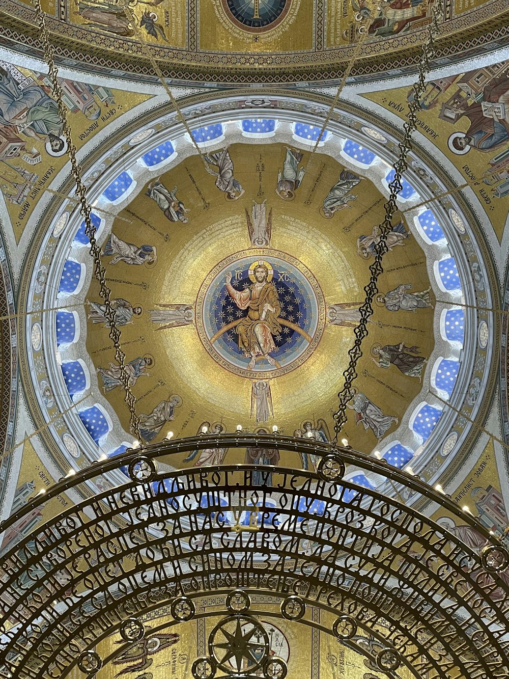 a domed ceiling with a stained glass window