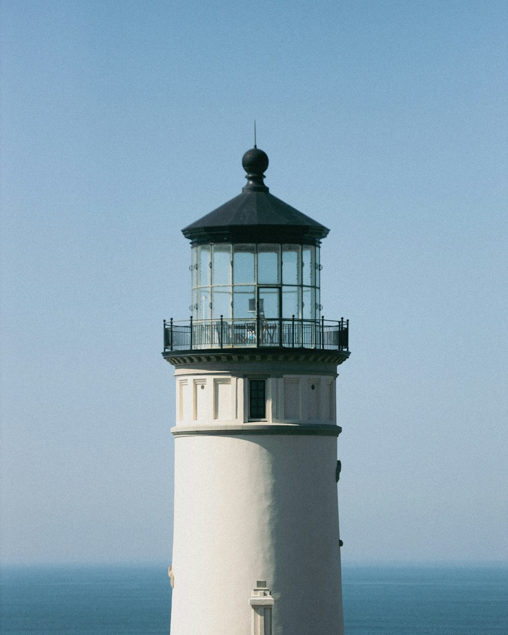 a lighthouse on a pier