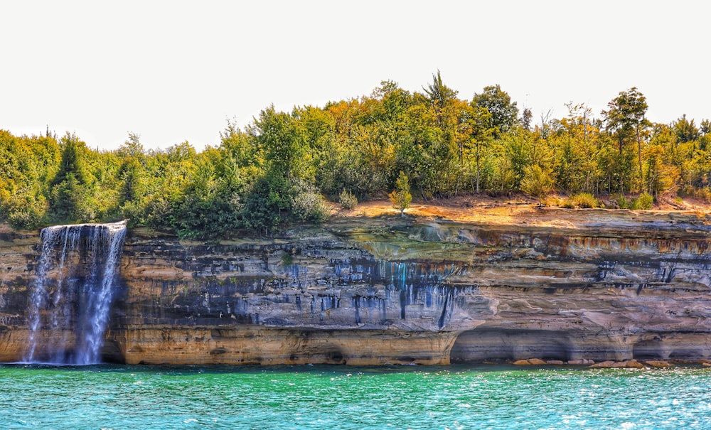 a waterfall over a cliff