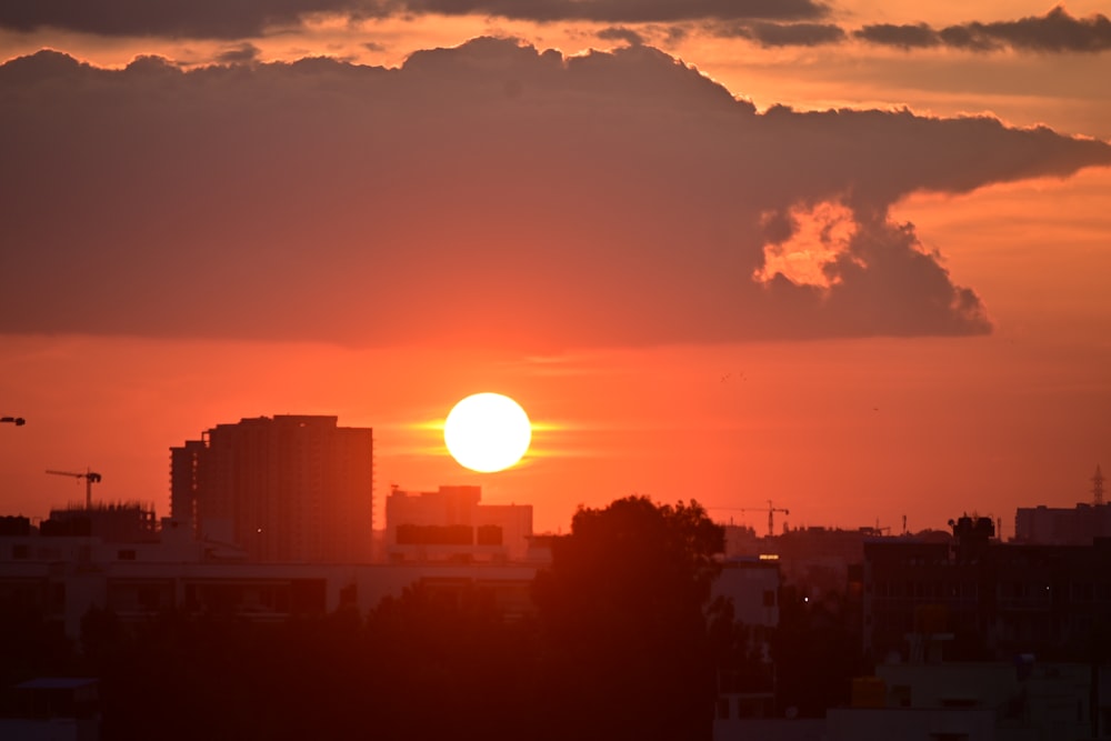 a sunset over a city