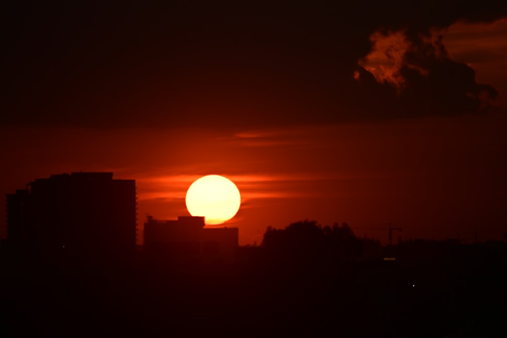 a sunset over a city