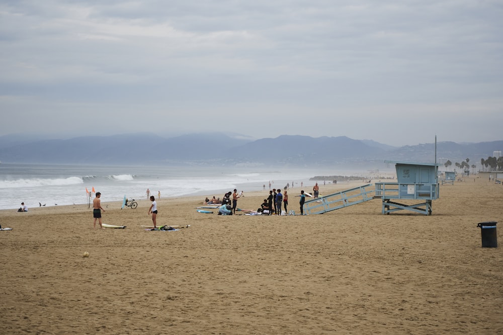 a group of people on a beach