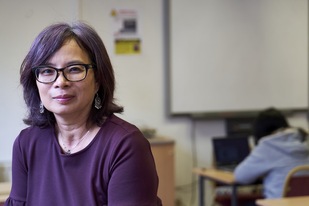 a woman wearing glasses