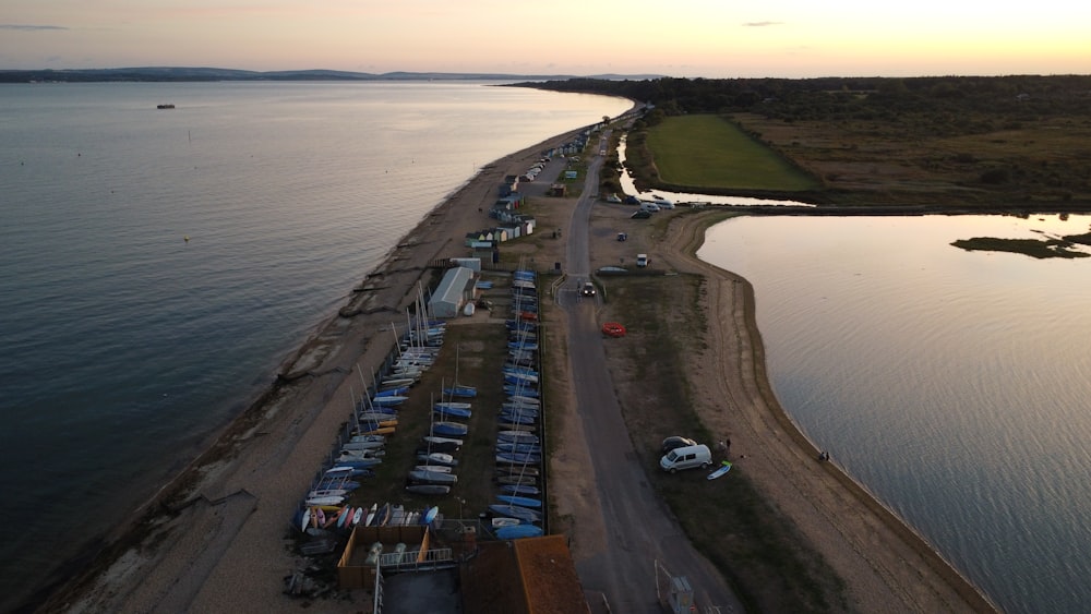 a beach with cars parked along it