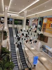a building with stairs and plants