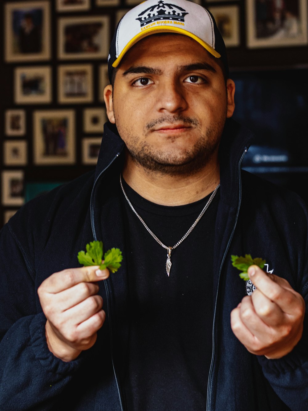 a man holding a plant