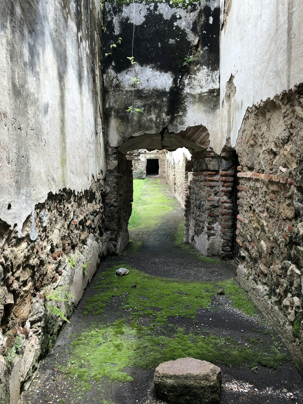 a stone walkway in a stone building