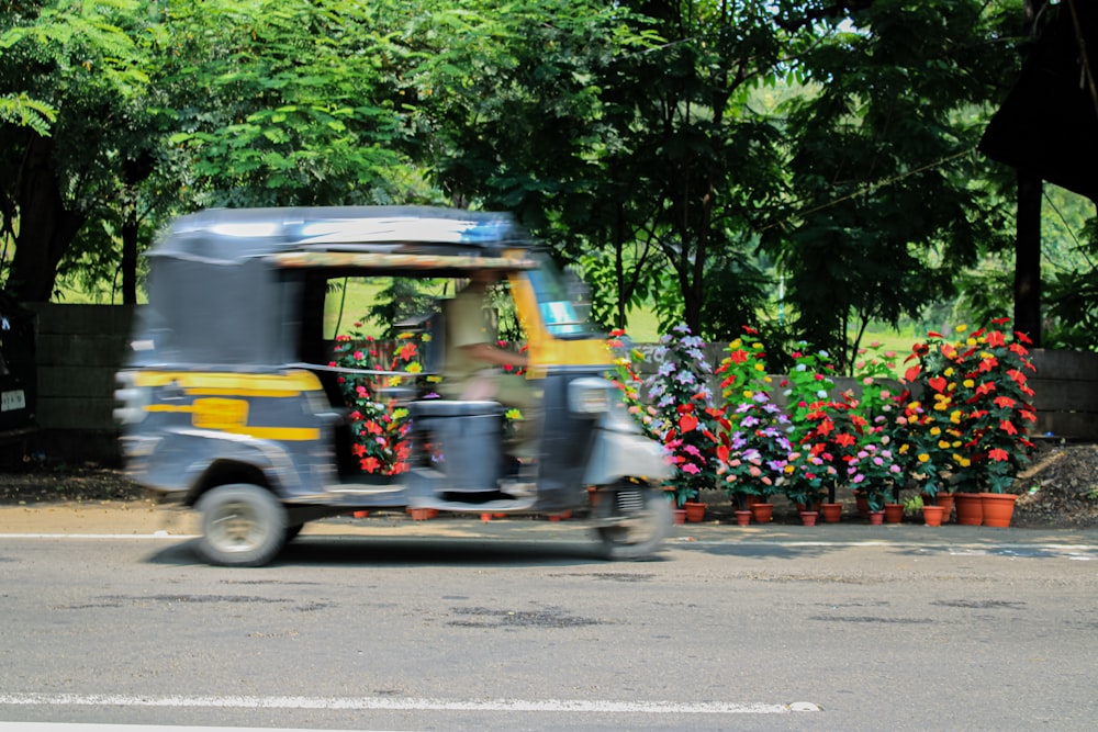 a person driving a small vehicle