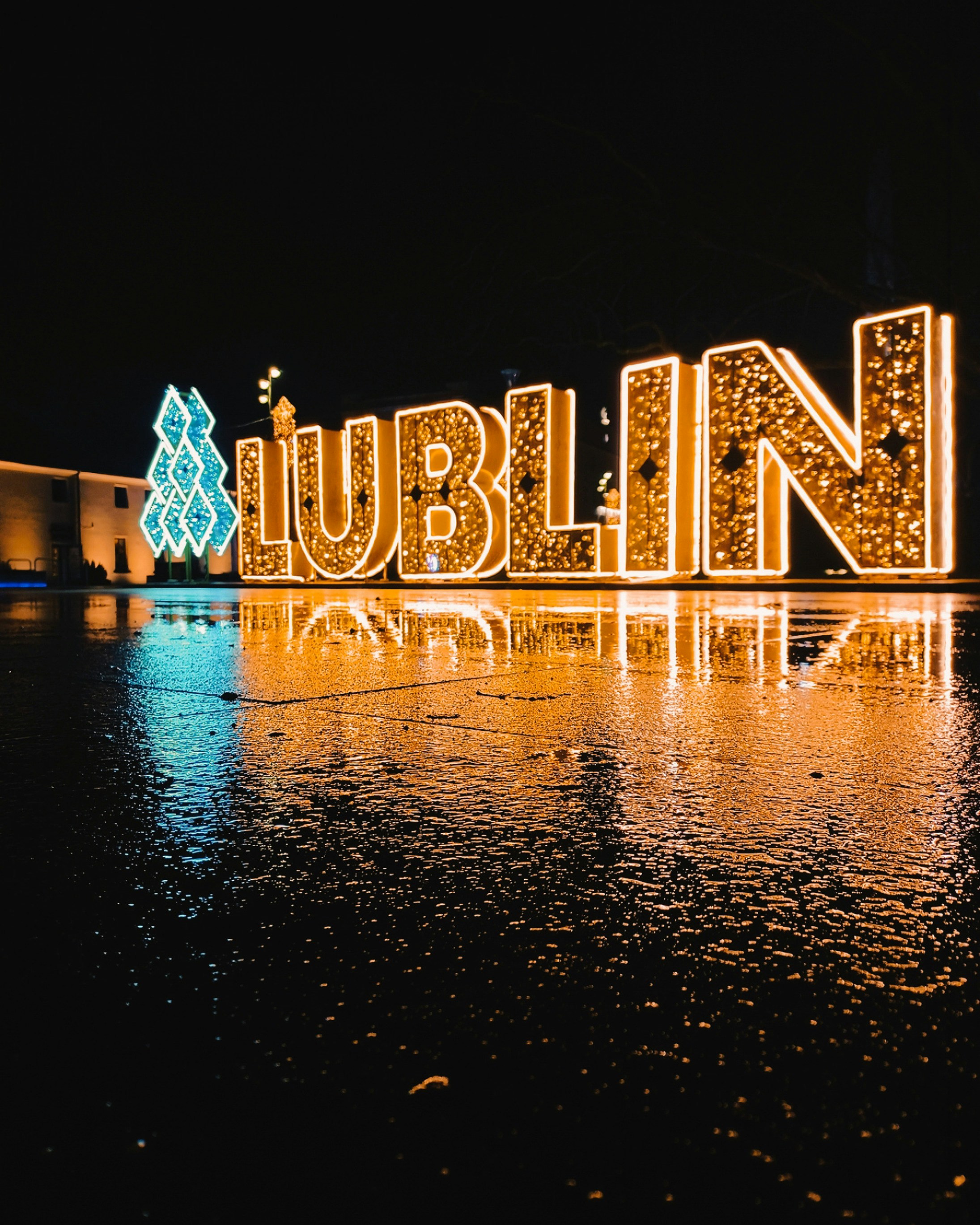a lighted sign on a building