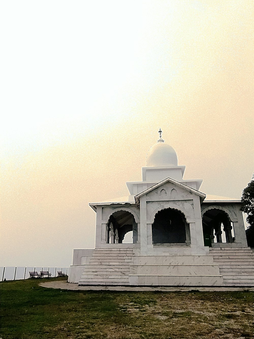 a white building with a domed roof