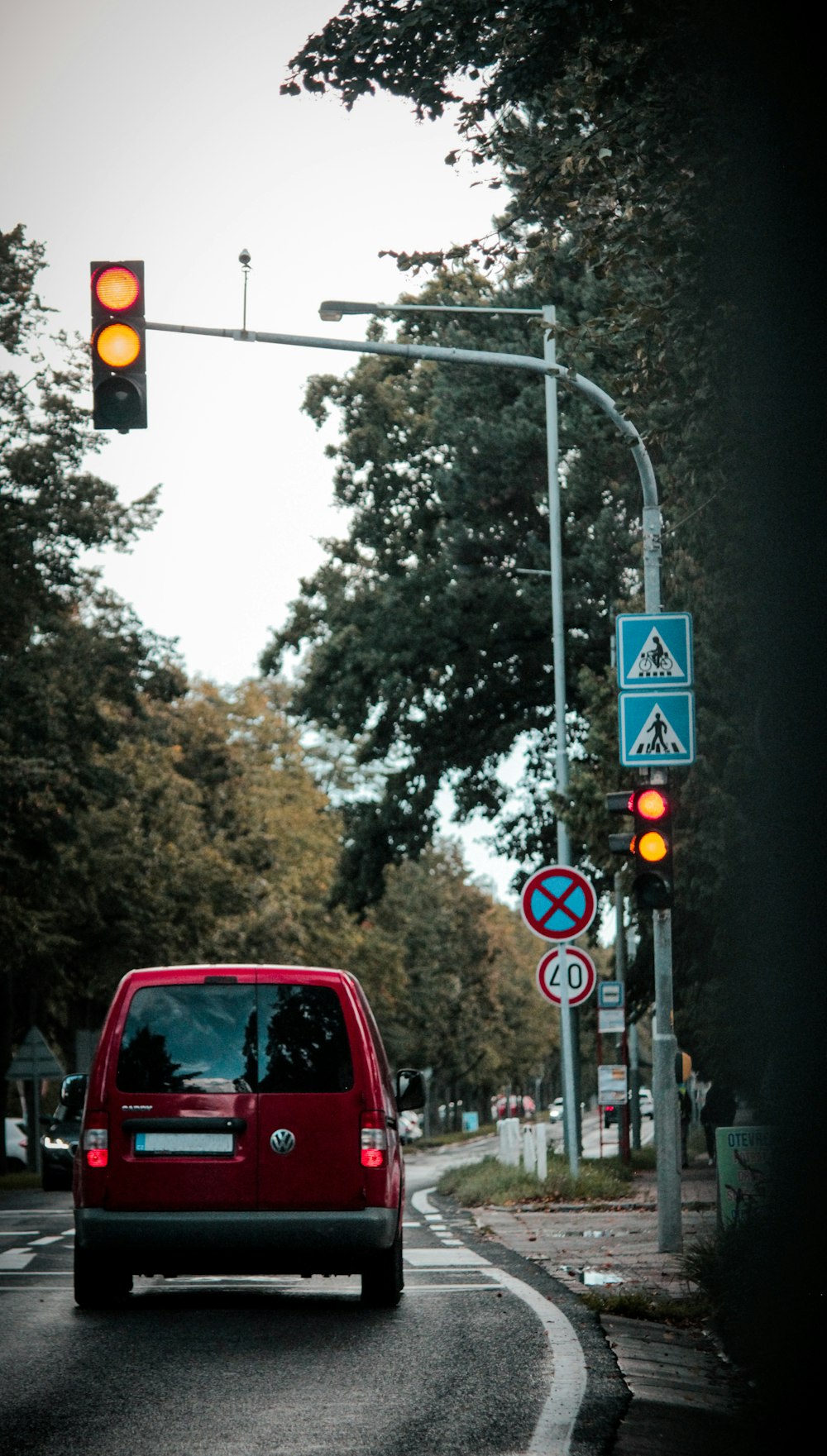 a red van at a red light