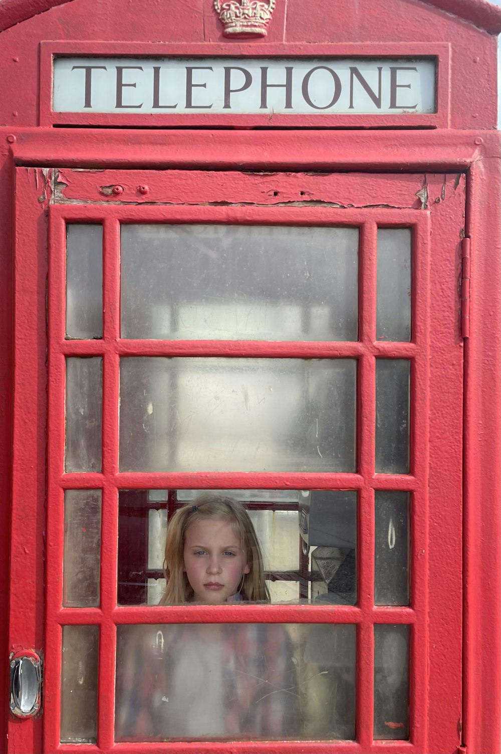 a person looking out a window