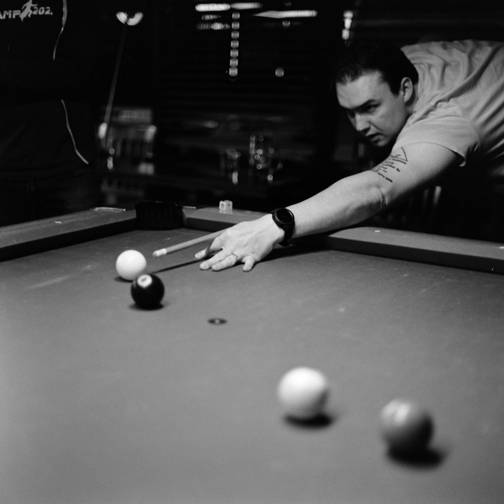 a man playing pool