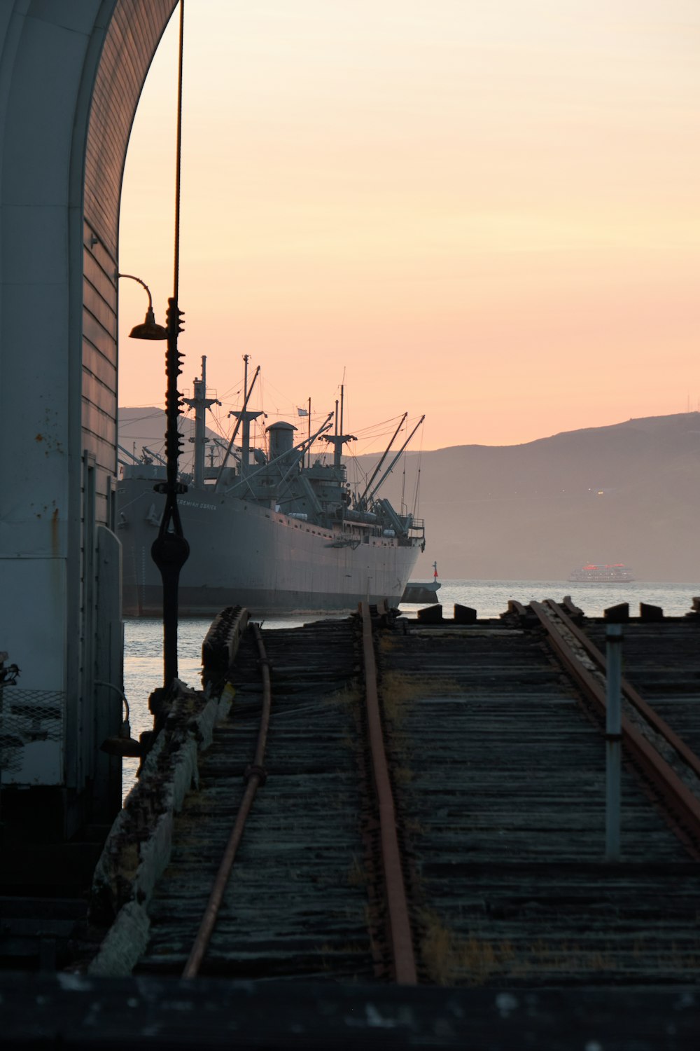 a boat docked at a pier