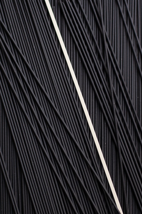 a close up of a black surface