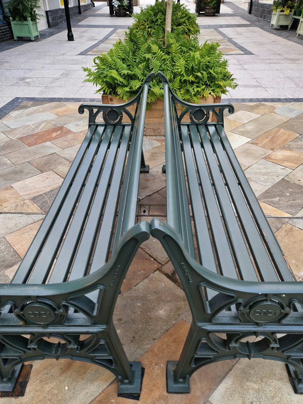 a couple of benches sit unoccupied