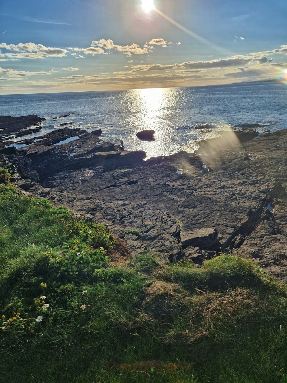 a beach with a body of water