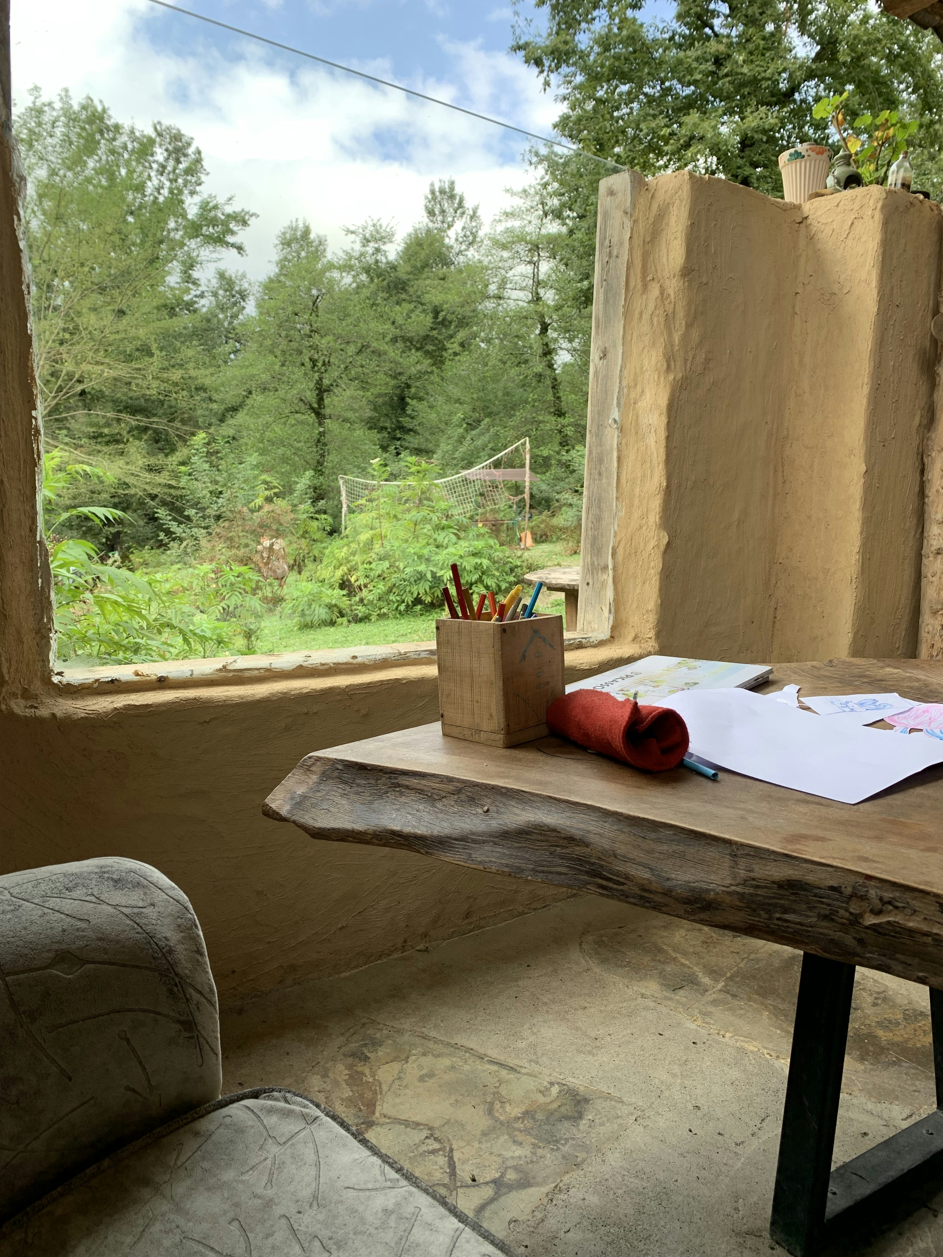 a table with a book and a bag on it