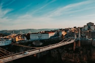 a bridge over a river with buildings on either side of it