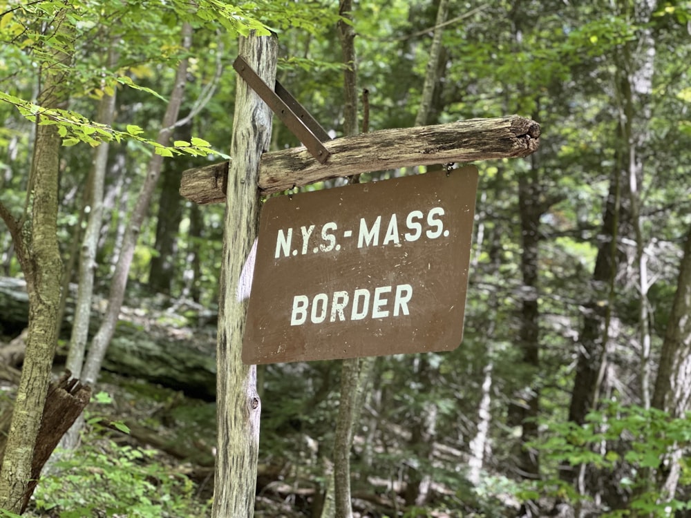 a sign in the woods