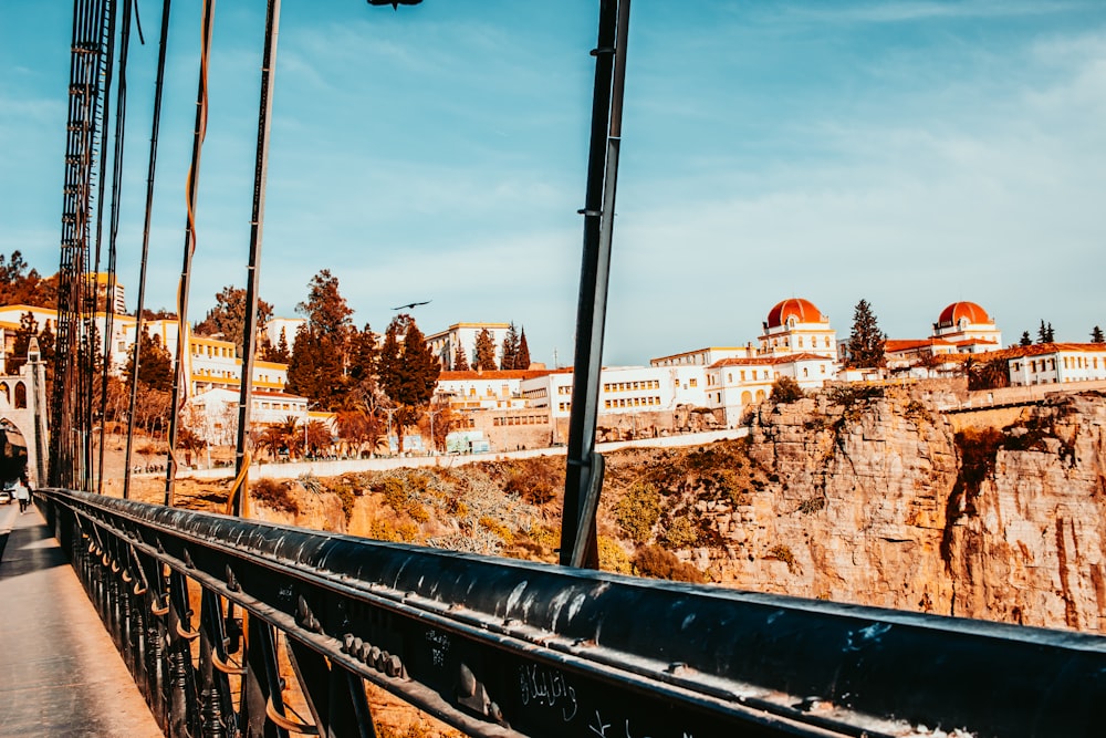 a wall with a city in the background