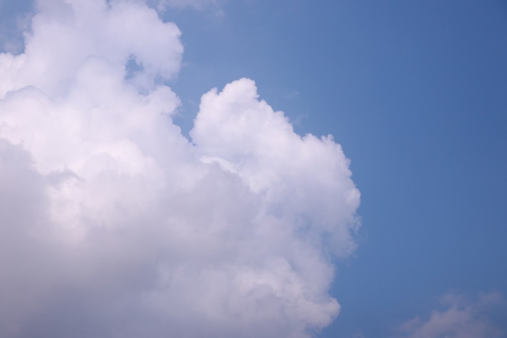 a blue sky with white clouds