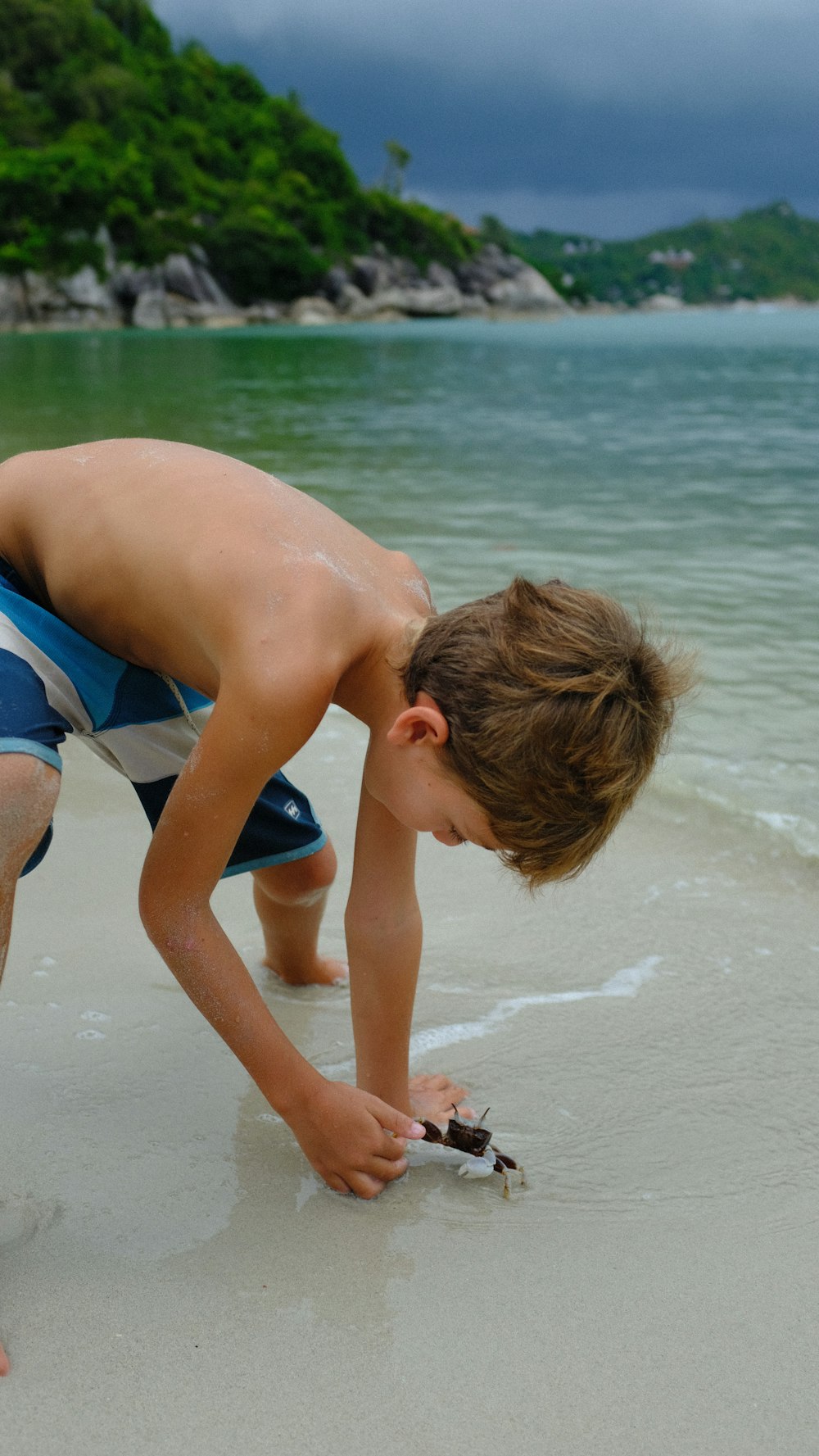 a person playing with a toy on the beach