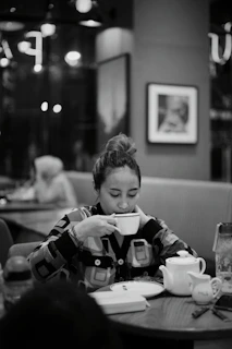 a person sitting at a table