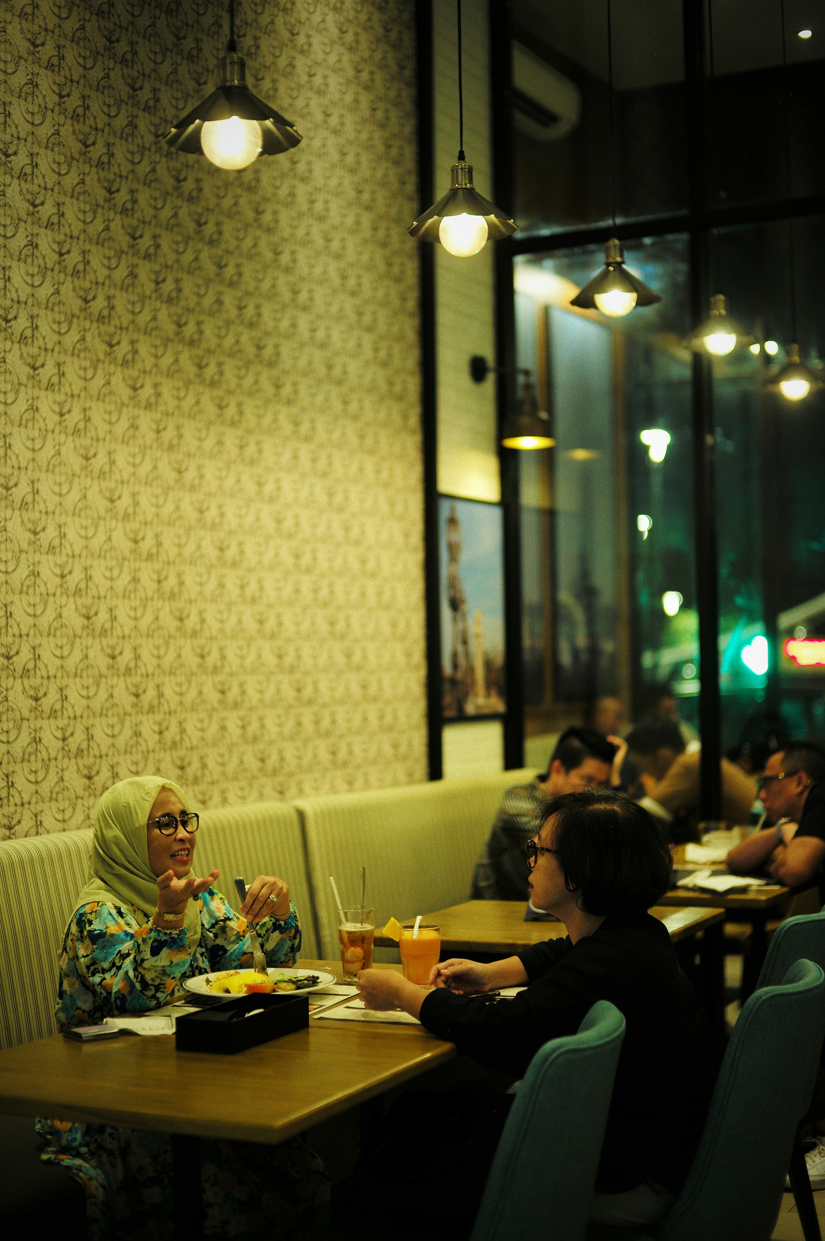 A busy fast-casual dining restaurant interior with customers