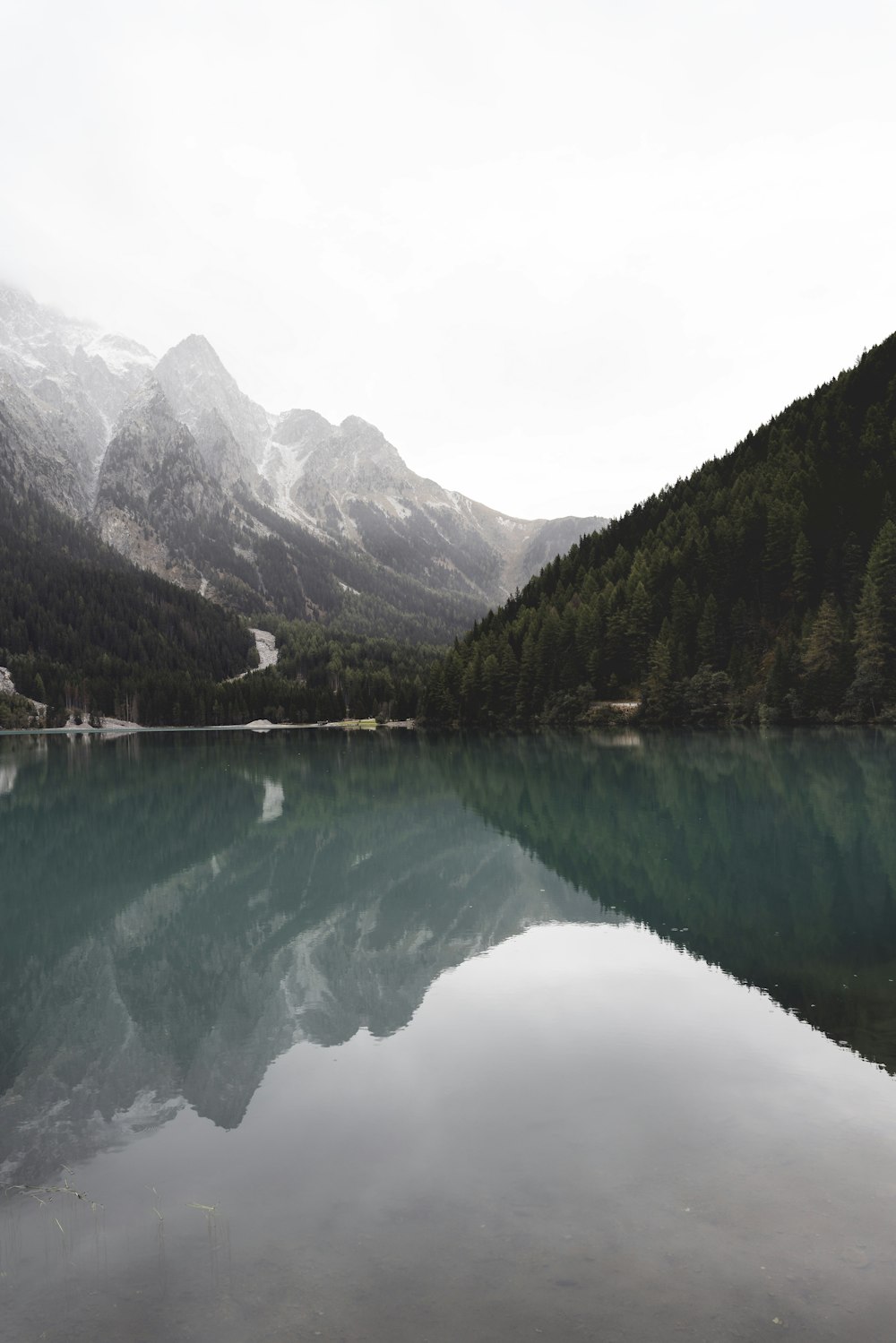 a lake surrounded by mountains