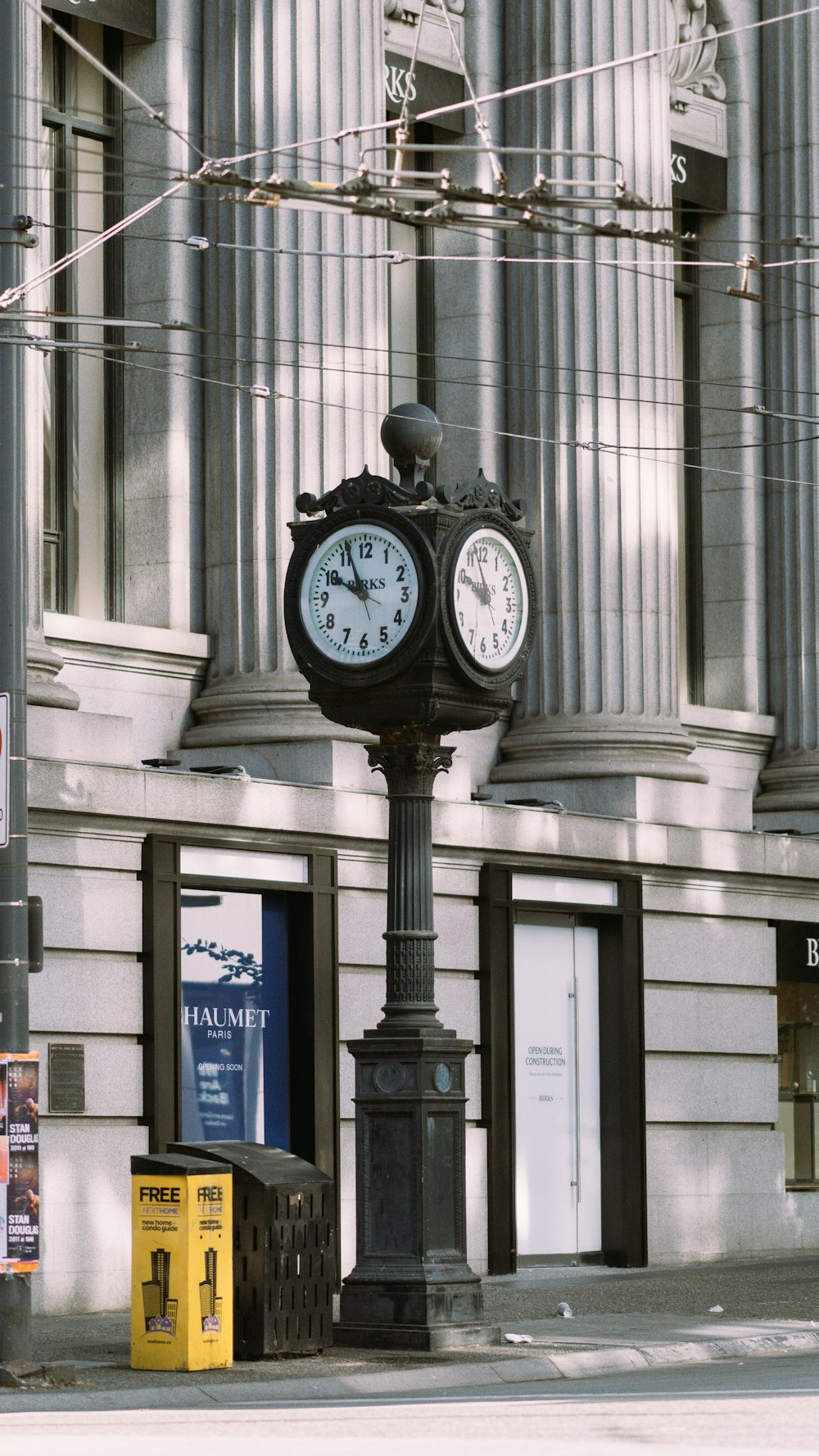 a clock on a pole