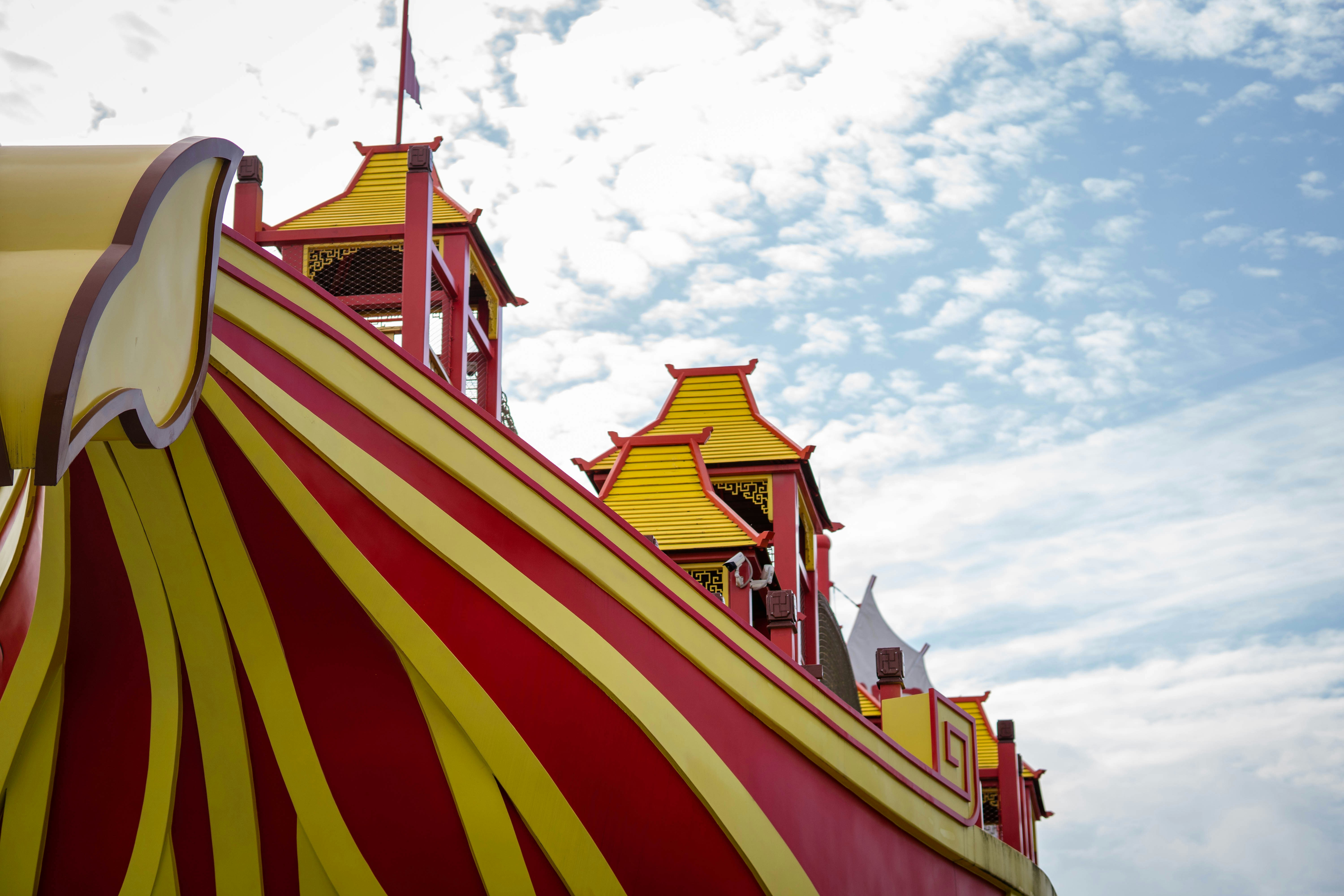 a colorful building with a flag