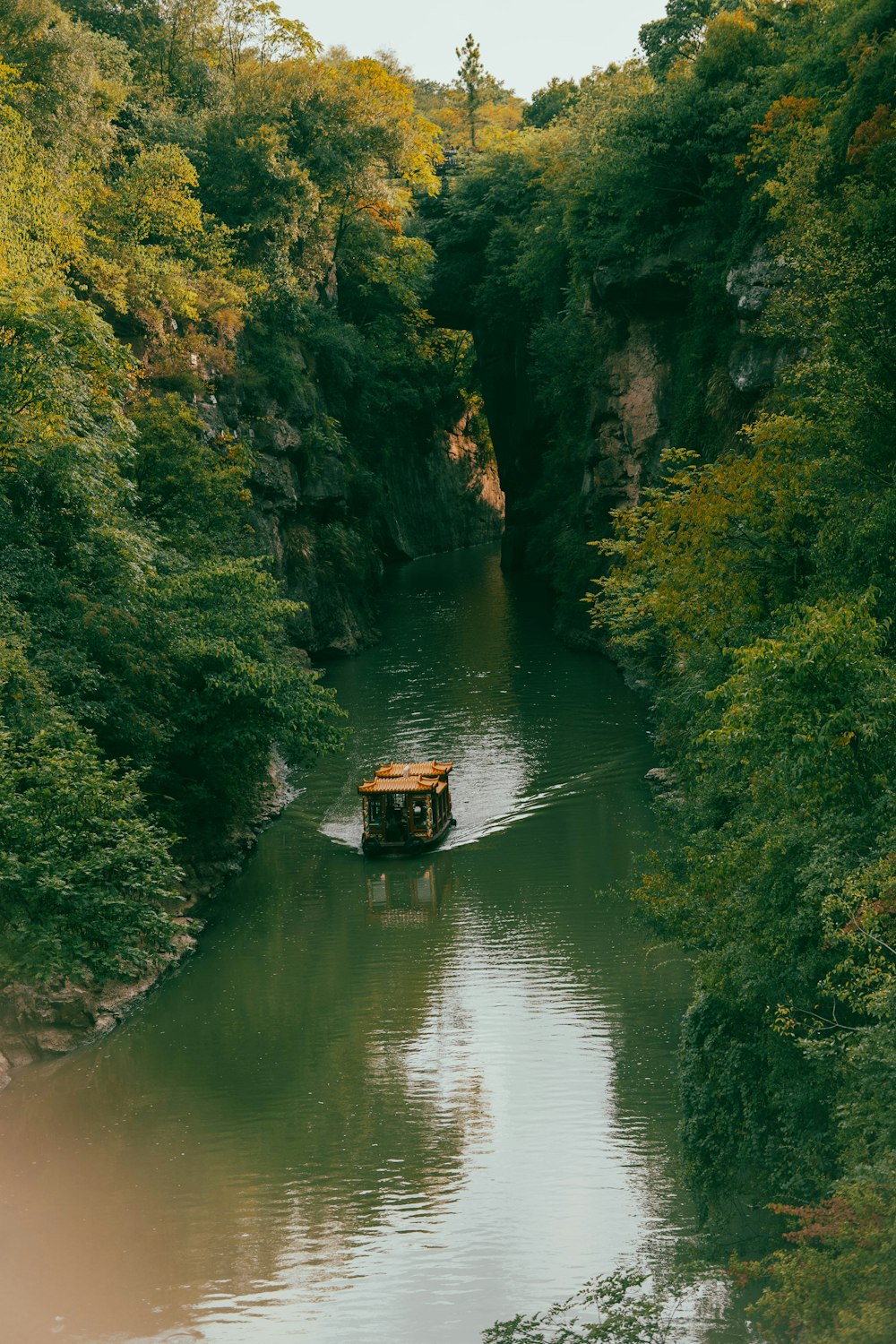 a couple of boats on a river